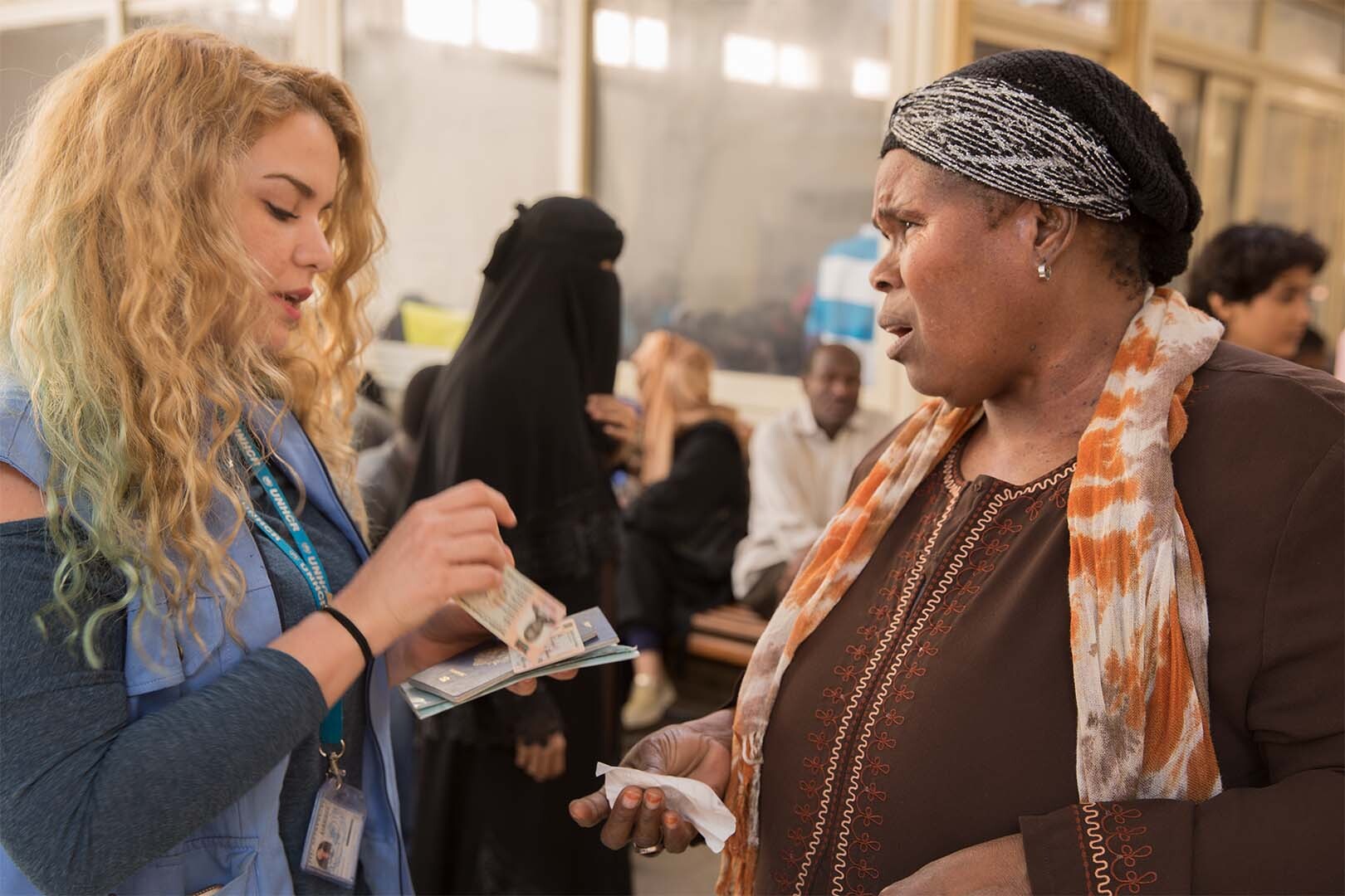National UN Volunteer Registration Assistant Nour Abdelhak, with UNHCR, counselling refugees and asylum-seekers at UNHCR reception centre in Cairo, Egypt.